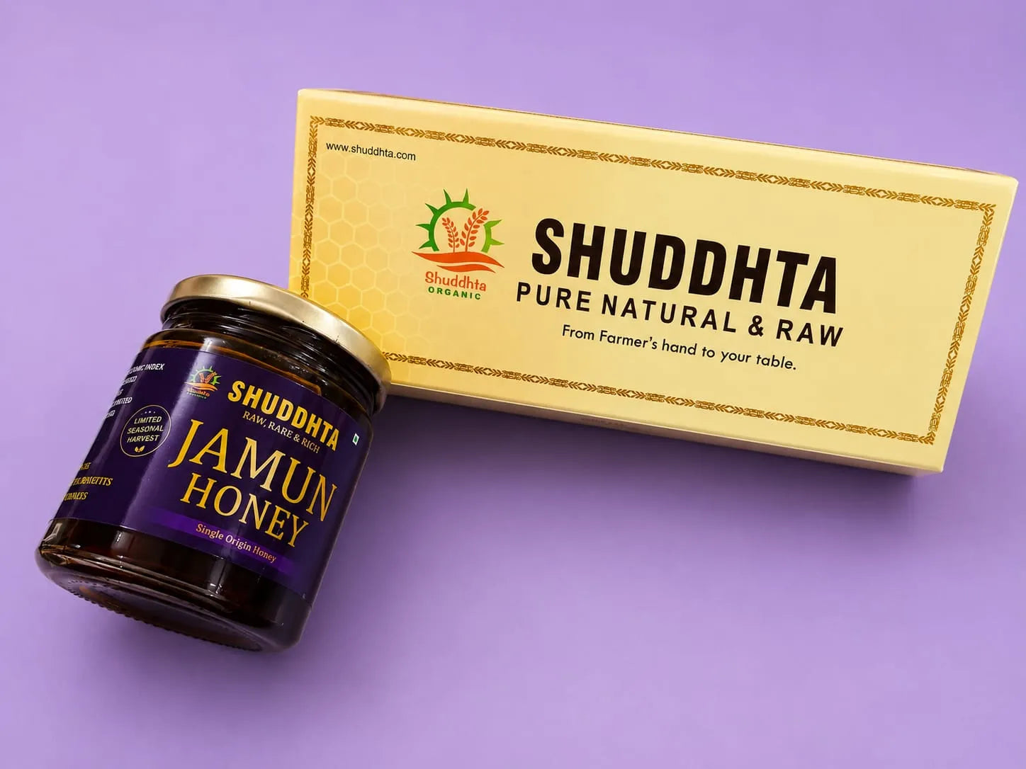 Shuddhta Jamun Honey jar and packaging on a purple background