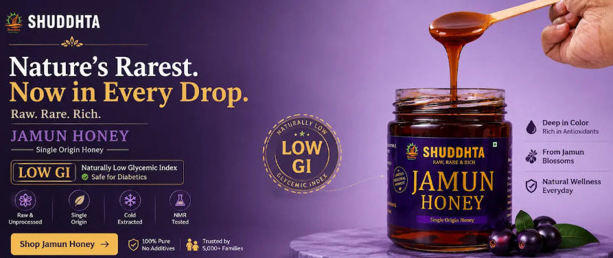 Shuddhta Jamun Honey jar with a spoonful of honey on a purple background