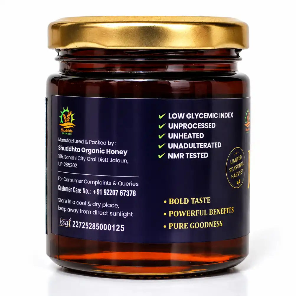 Shuddhta Jamun Honey glass jar with gold lid and navy label on a white background