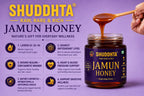 Shuddhta Jamun Honey jar with a spoonful of honey on a purple background